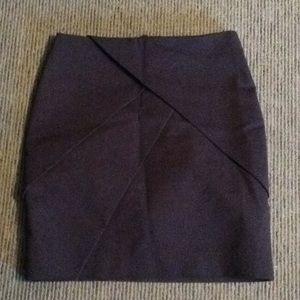 H&M grey skirt with architectural folds.